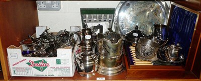 Lot 130 - Shelf of silver plated items including flatware, cased fish knives and forks, tea set, muffin...