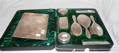 Lot 139 - A cased silver dressing set