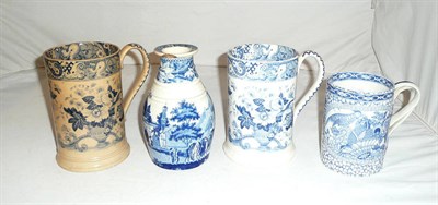 Lot 157 - Two 19th century floral decorated blue and white mugs, a 19th century blue and white decanter...