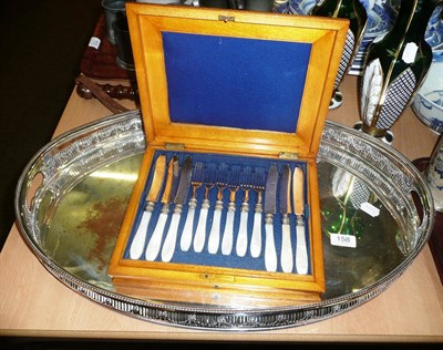 Lot 158 - Plated copper oval galleried tray and a set of twelve cased mother-of-pearl-handled dessert...