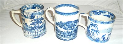 Lot 162 - A 19th century pearlware blue and white mug and two others (a.f.)
