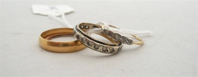 Lot 191 - An 18ct gold band ring 2.6g, a 9ct gold band ring and two stone-set rings (all very worn)