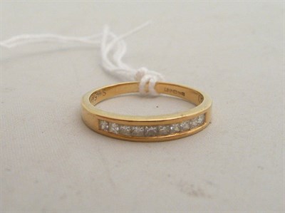 Lot 208 - An 18ct gold diamond half eternity ring