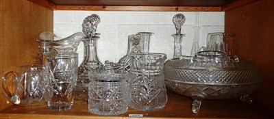 Lot 249 - Shelf of assorted cut glass including a large bowl, basket, decanters, etc