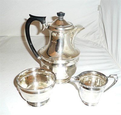 Lot 271 - A silver coffee pot, Sheffield and a matching silver milk jug and sugar bowl (3)