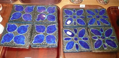 Lot 285 - Two sets of twelve modern design tiles with blue glazed decoration
