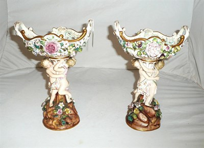 Lot 287 - A pair of floral encrusted centrepiece baskets