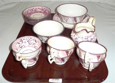 Lot 298 - A quantity of pink lustre tea wares