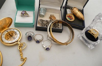 Lot 314 - Two rings, 1/10th krugerrand coin brooch, a bracelet, a gold plated pocket watch, two silver...