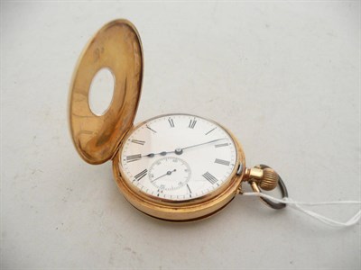 Lot 319 - A half hunting-cased pocket watch stamped '18k'