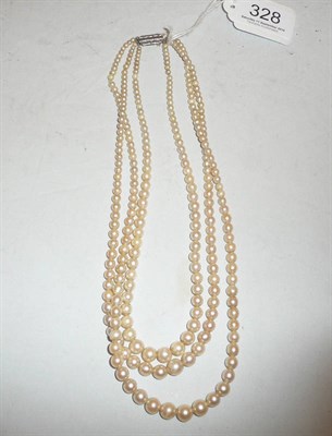 Lot 328 - A three-strand cultured pearl necklace