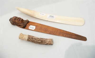 Lot 356 - Ivory page turner, carved horn handle and a carved page turner