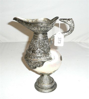 Lot 373 - Nautilus shell white metal-mounted pedestal ewer, 20th century