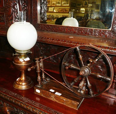 Lot 388 - Bobbin winder and an oil lamp with shade