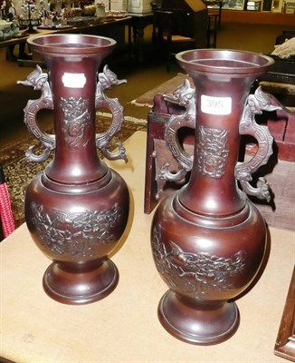 Lot 395 - Pair of Japanese bronze twin-handled vases