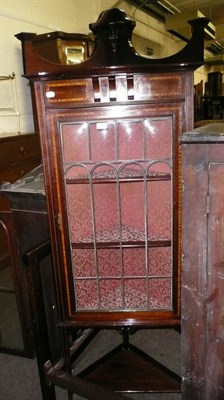 Lot 493 - A mahogany glazed corner cabinet