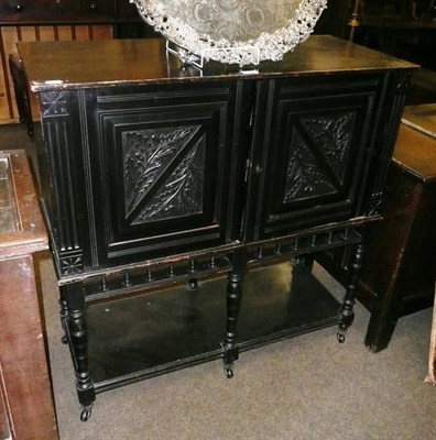 Lot 522 - Ebonised cabinet