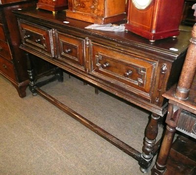 Lot 539 - A 17th century-style oak low dresser