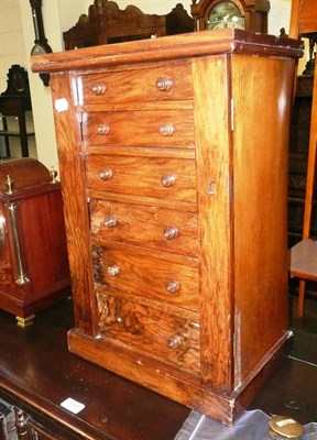 Lot 540 - A small walnut Wellington chest