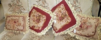 Lot 570 - Four upholstered cushions