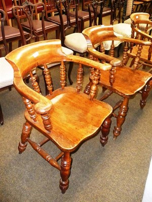 Lot 574 - A pair of captain's chairs