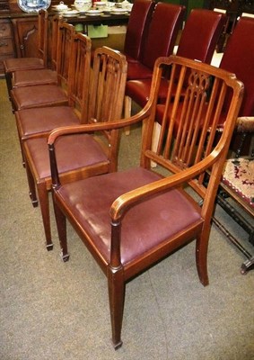 Lot 577 - A set of six inlaid mahogany dining chairs including one elbow chair