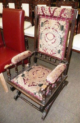 Lot 578 - A late 19th century American rocking chair