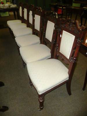 Lot 580 - A set of six oak framed dining chairs