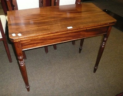 Lot 583 - Mahogany fold-over tea table