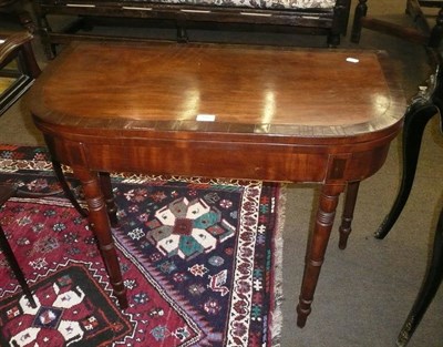 Lot 586 - Regency mahogany card table