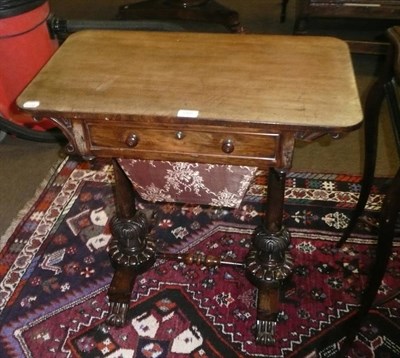 Lot 588 - 19th century rosewood work table