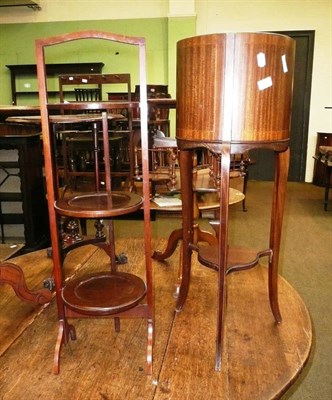 Lot 593 - A mahogany cake stand and a mahogany jardiniere stand