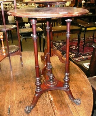 Lot 597 - Victorian circular tripod table.