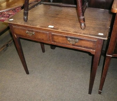 Lot 599 - An 18th century oak side table with two drawers