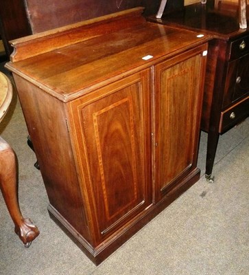 Lot 609 - Edwardian cross-banded mahogany two door cupboard