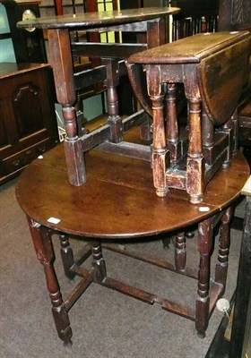 Lot 614 - Two small oak drop leaf tables and another oak table