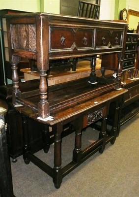 Lot 615 - Oak low dresser base and an oak table (altered)