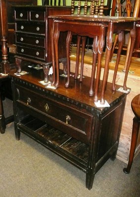 Lot 616 - A mahogany nest of tables, a small reproduction mahogany chest of drawers and an oak buffet