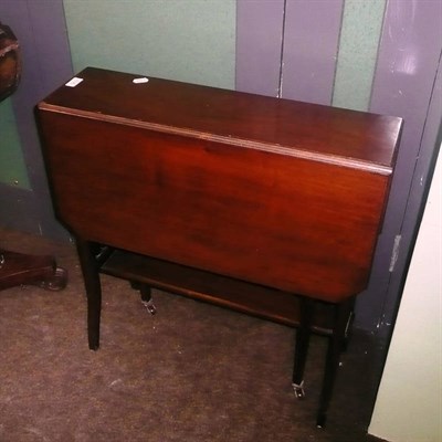 Lot 636 - A mahogany Sutherland table