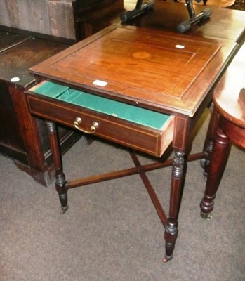 Lot 643 - A mahogany games table