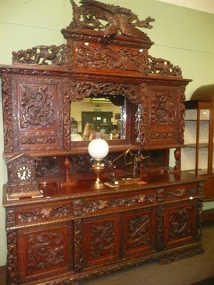 Lot 648 - A large carved Chinese mirror back sideboard