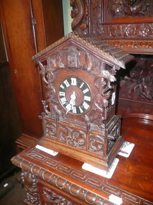 Lot 649 - A striking cuckoo mantel clock