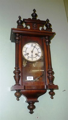 Lot 652 - Walnut-cased small Vienna-style wall clock