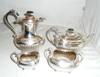 Lot 4 - A three piece silver tea set and a plate water jug