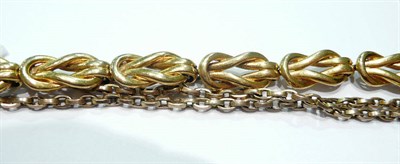 Lot 55 - A 9ct gold reef knot bracelet and a necklace