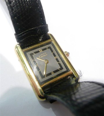 Lot 65 - A Cartier silver gilt wristwatch