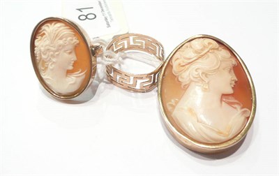 Lot 81 - A Continental shell cameo brooch and ring and a pierced key pattern ring (3)