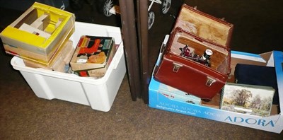 Lot 127 - Two boxes including child's sewing machines, some in original packaging, toy record player,...
