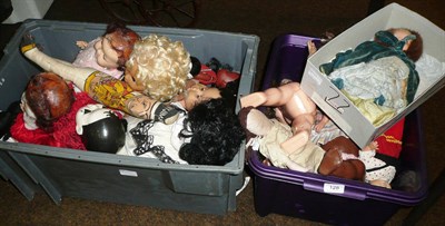 Lot 128 - Two boxes of assorted celluloid and later dolls, a cream painted push chair and a caned pram