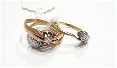 Lot 150 - A diamond two stone ring and two diamond rings